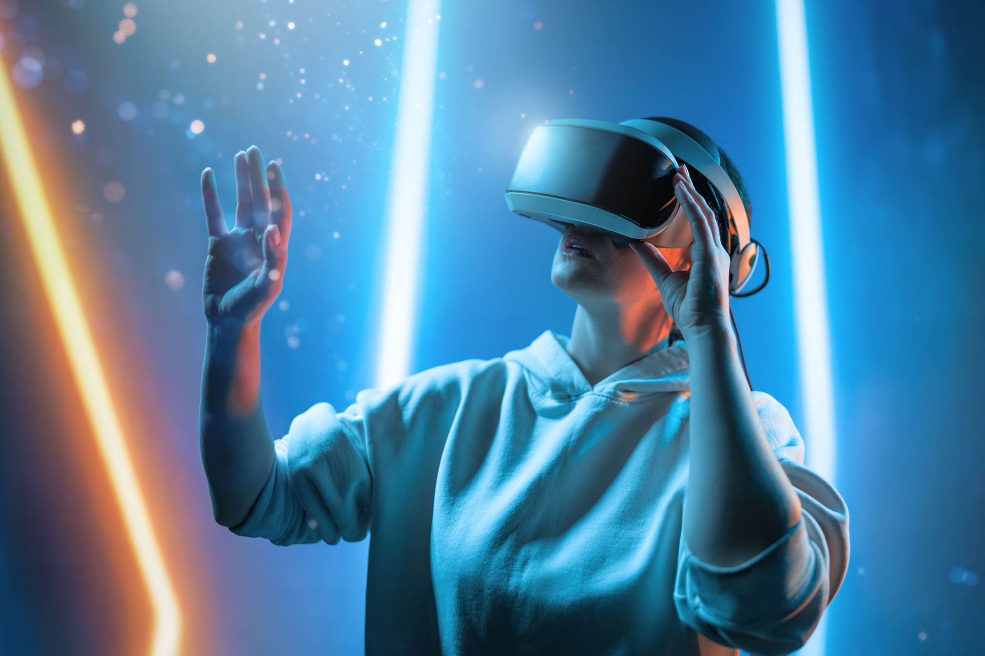 Woman with VR virtual reality goggles